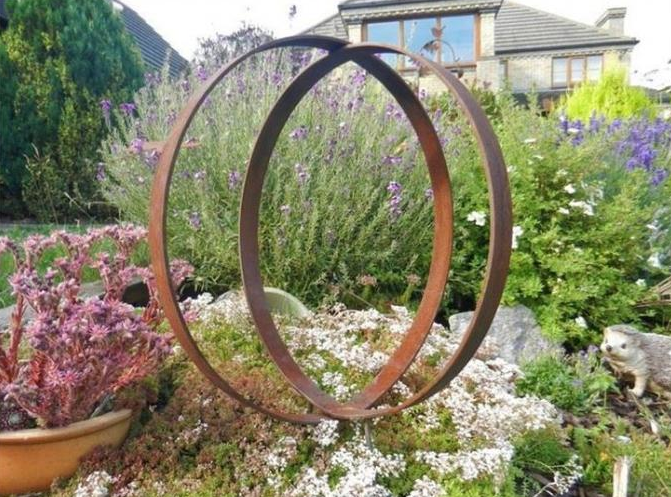 大きく無作法な金属リング円の庭の芸術のCortenの鋼鉄庭リングたがの彫刻