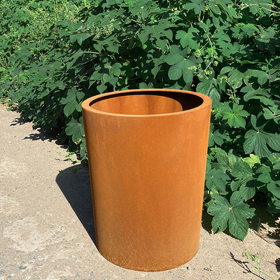 裏庭の屋外の円形のCortenの鋼鉄植木鉢はプランター箱に金属をかぶせる