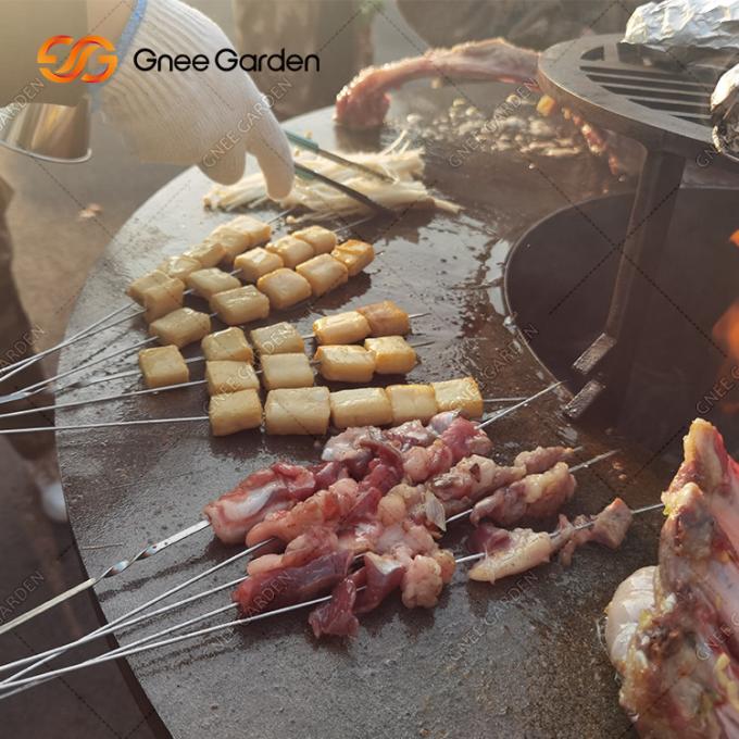 木製の非常に熱いCorten鋼鉄屋外BBQのテーブル・ファイア ピットのバーベキューのグリルの木炭Bbqの働きスタッフ